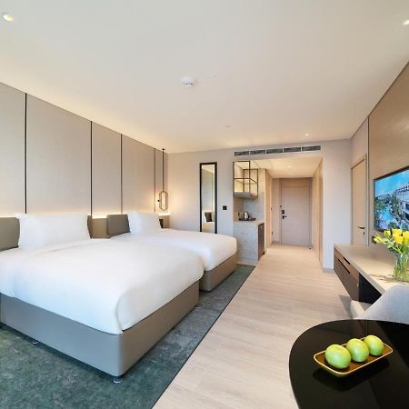 Al Ain Rotana Hotel Exterior photo Deluxe Room