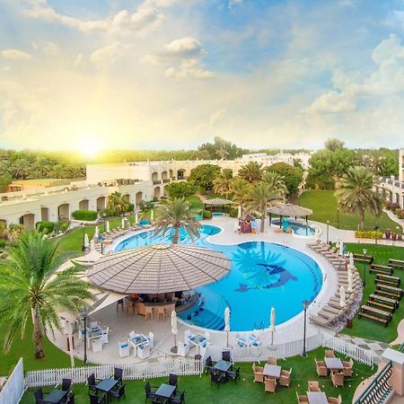 Al Ain Rotana Hotel Exterior photo The pool at the resort