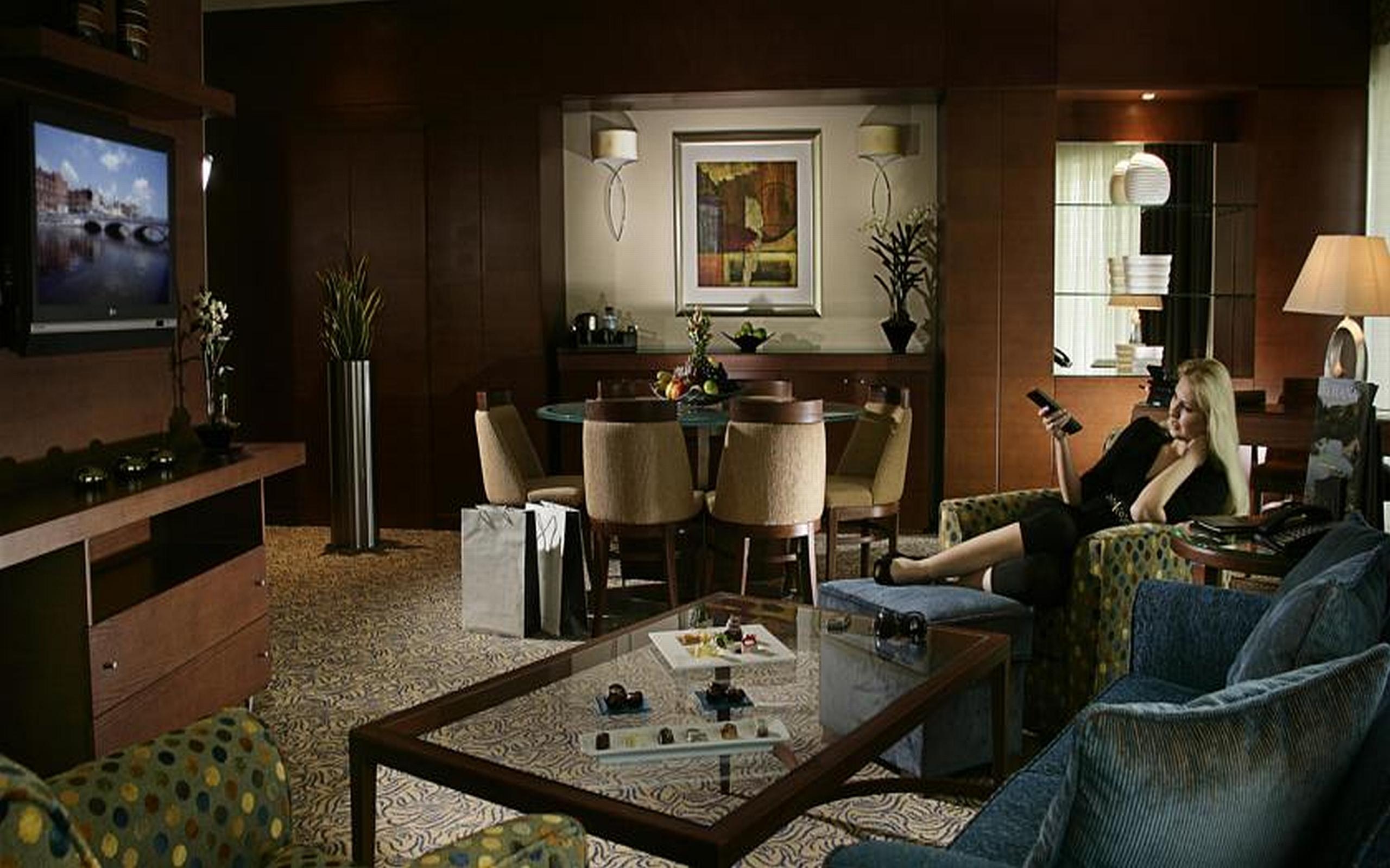 Al Ain Rotana Hotel Exterior photo A computer-generated image of a living room