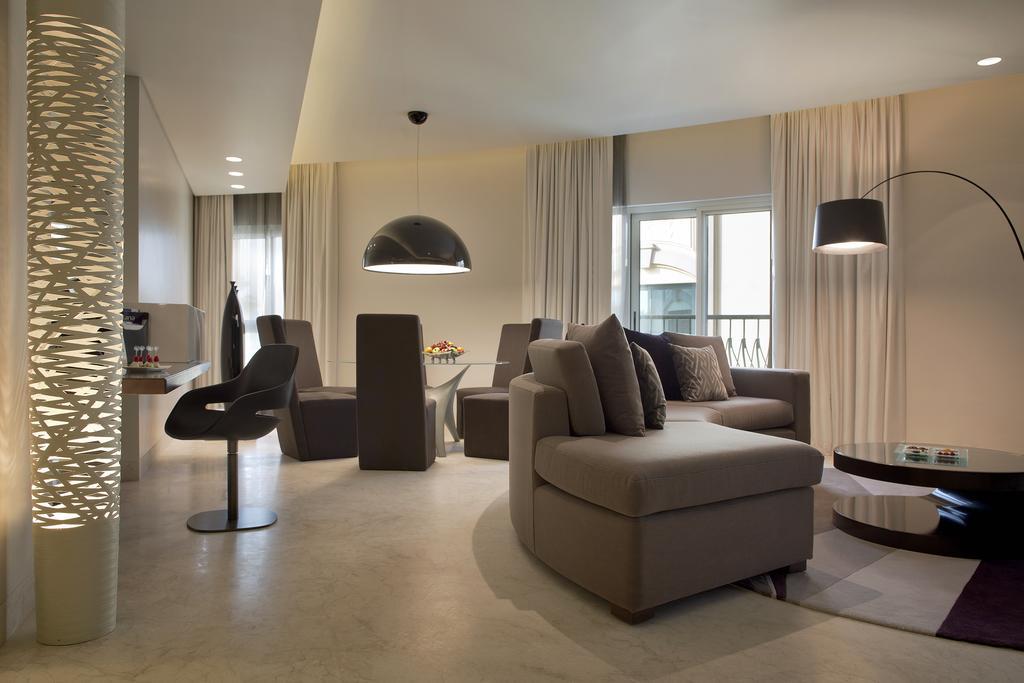 Al Ain Rotana Hotel Exterior photo A living room