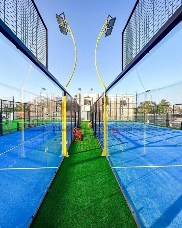 Al Ain Rotana Hotel Exterior photo A paddle tennis court